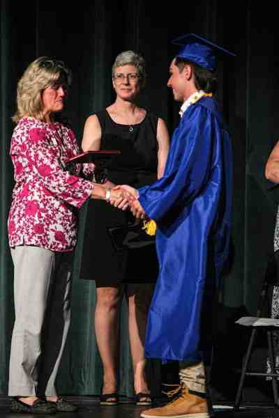 gail james hamel - Ben Bronz Academy School official congratulating student.