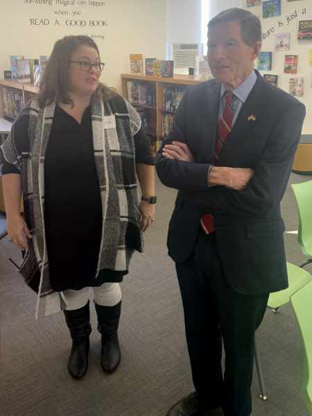 Assistant Education Director Cynthia Fries speaking with Senator Blumenthal.