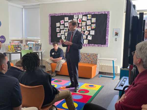 Senator Richard Blumenthal speaking to a group of students and teachers.